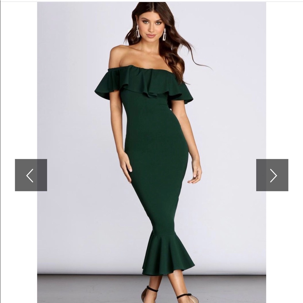 Over the shoulder midi green dress.